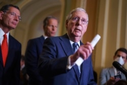 FILE - Senate Minority Leader Mitch McConnell, R-Ky., speaks to reporters at the Capitol in Washington, Sept. 28, 2021.