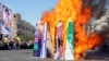 آتش زدن پرچم های آمریکا، اسرائیل و عربستان در راهپیمایی روز قدس در ایران - تیر ۱۳۹۴