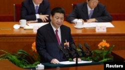 တရုတ်နိုင်ငံ အမျိုးသားလွှတ်တော် နောက်ဆုံးနေ့ပိတ်ပွဲ အခမ်းအနားမှာ သမ္မတရှီကျင်းပင် မိန့်ခွန်းပြောကြားနေစဉ်။ (မတ်လ ၁၇ ရက်၊ ၂၀၁၃)။