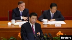 China's newly-elected President Xi Jinping delivers a speech during the closing session of the National People's Congress in Beijing March 17, 2013.