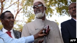 Ahmed Mohamed Madobe, leader of the Ras Kamboni militia, speaks during a meeting for the creation of a State of Jubaland in Kismayo, Somalia, Feb. 28, 2013. 