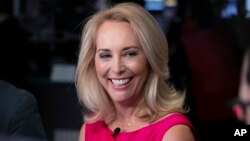 FILE - Former undercover CIA officer Valerie Plame is interviewed on Cheddar, on the floor of the New York Stock Exchange, Oct. 22, 2018.