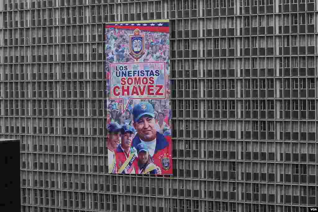 A government building in Caracas displays a poster with an image of the late Venezuelan president Hugo Chavez.