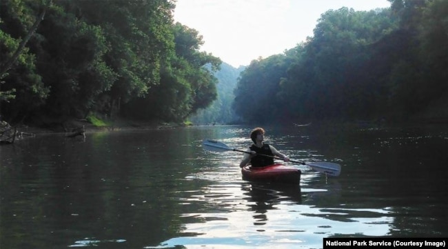 A person kayaks on the Green River