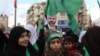 Hamas supporters carrying green flags rally in West Bank, December 14, 2012. ( VOA/R. Collard)