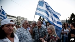Protest protiv mera štednje održan ispred parlamenta u Atini, 17. juna 2015. 
