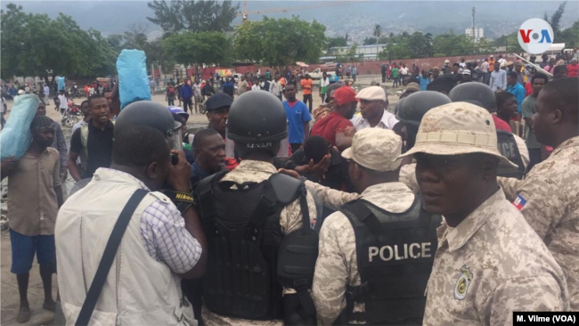Protesters gather in front of of the Haitian parliament in Port au Prince, May 30, 2019.