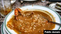 Gumbo is considered the official dish of Louisiana. The dish has an okra and tomato sauce base and typically contains seafood, sausage, rice and spices..