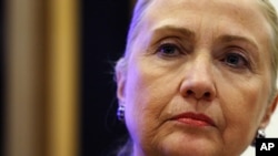 Secretary of State Hillary Rodham Clinton listens to a question during a joint news conference, December 6, 2012.