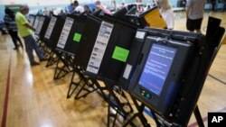 An electronic voting machine in Columbus, Ohio, Nov. 3, 2015. Democrats and Republicans compete in primaries and caucuses in at least 11 states and one U.S. territory on Tuesday.