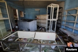 A general view of the damage at a mini-market after it was looted in Puerto Ordaz, Venezuela, Jan. 9, 2018.