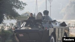 Myanmar's military checkpoint is seen on the way to the congress compound in Naypyitaw, Myanmar, February 1, 2021. REUTERS/Stringer