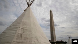 A group protesting the Dakota Access oil pipeline has set up teepees on the National Mall near the Washington Monument in Washington, March 7, 2017.