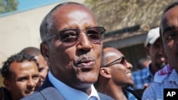 FILE - President Muse Bihi Abdi was a candidate, Nov. 134, 2017, when he spoke to the media after casting his vote in the presidential election in Hargeisa, in the semi-autonomous region of Somaliland.