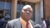 Job Sikhala, the lawyer for former foreign affairs minister Walter Mzembi, talks to reporters after court proceedings where he said charges against his client were "really ridiculous," in Harare, Zimbabwe, Jan 6, 2018. (S. Mhofu/VOA)