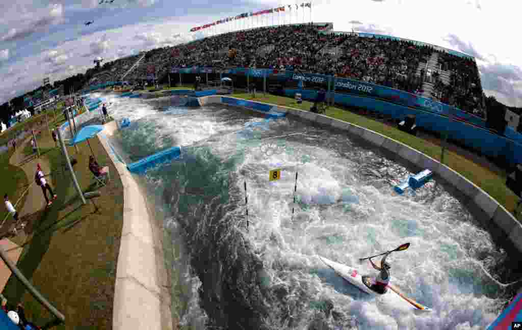Germany&#39;s Jasmin Schornberg competes in the women&#39;s K-1 kayak slalom heats at the Lee Valley White Water Center.