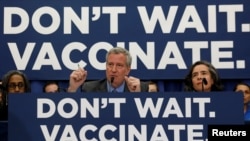 FILE - New York City Mayor Bill de Blasio speaks during a news conference declaring a public health emergency in parts of Brooklyn in response to a measles outbreak, April 9, 2019.