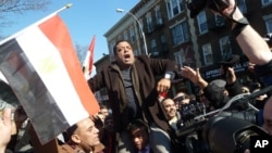 People celebrate President Mubarak's resignation on the streets of New York City, Feb 11, 2011