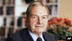 David Rockefeller poses for a photograph. The billionaire philanthropist who was the last of his generation in the famously philanthropic Rockefeller family died, March 20, 2017, according to a family spokesman. 