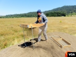 "I thought that doing this would give me a really good insight into the war and give me both sides of the story," said University of Oregon archaeology student and Coos tribal member Courtney Krossman. (Tom Banse for VOA)