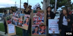 FILE - A crowd of Cambodian Americans protests the visit of Lt. Gen. Hun Manet in Long Beach, California, April 9, 2016.