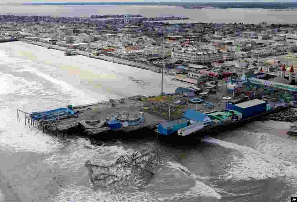 This aerial photo shows the damage to an amusement park left in the wake of superstorm Sandy on October 31, 2012, in Seaside Heights, N.J.