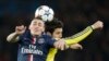 Marco Verratti et Cesc Fabregas lors du match entre le PSG et Chelsea au stade du Parc des Princes à Paris, France, le 17 février 2015.