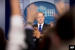 White House press secretary Sean Spicer takes a question from a member of the media during the daily press briefing at the White House in Washington, March 21, 2017.