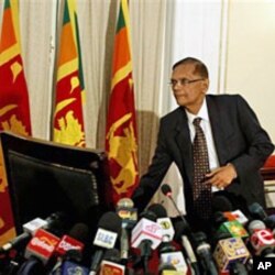 Sri Lanka's External Affairs Minister Gamini Peiris leaves a media briefing in Colombo, Apr 21 2011