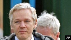 WikiLeaks founder Julian Assange arrives at Belmarsh Magistrates' Court in London, February 7, 2011