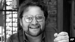 FILE - Actor Stephen Furst poses for a photo in Los Angeles in May 1986. Furst's family said the "Animal House" actor died of complications from diabetes, June 17, 2017.