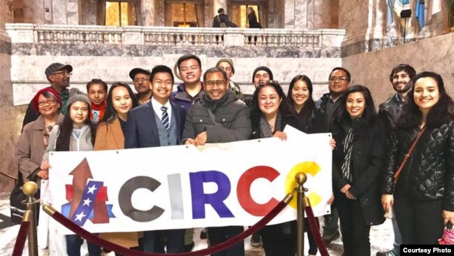 Sameth Mell, center, stands alongside members of the Coalition of Immigrants, Refugees, and Communities of Color (CIRCC) in Olympia, Washington, on Legislative Day. (Courtesy of Sameth Mell)