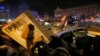 Ukrainian riot police storm pro-European Union activists on Independence Square in Kyiv, Dec 11, 2013.