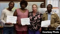 Marta Greenlaw, third from left, with some of her former students who have learned to lose some of their accent to be better understood in English. 