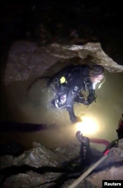 Ruamkatanyu Foundation rescuers are seen drillining ahead of the operation at the Tham Luang cave complex, where 12 boys and their soccer coach are trapped, in this screen grab of a video obtained on social media and taken July 7, 2018.