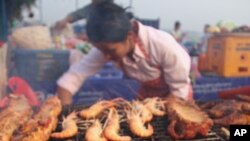 Grilled food stall in Vientiane that sells aqua-cultured Tilapia fish