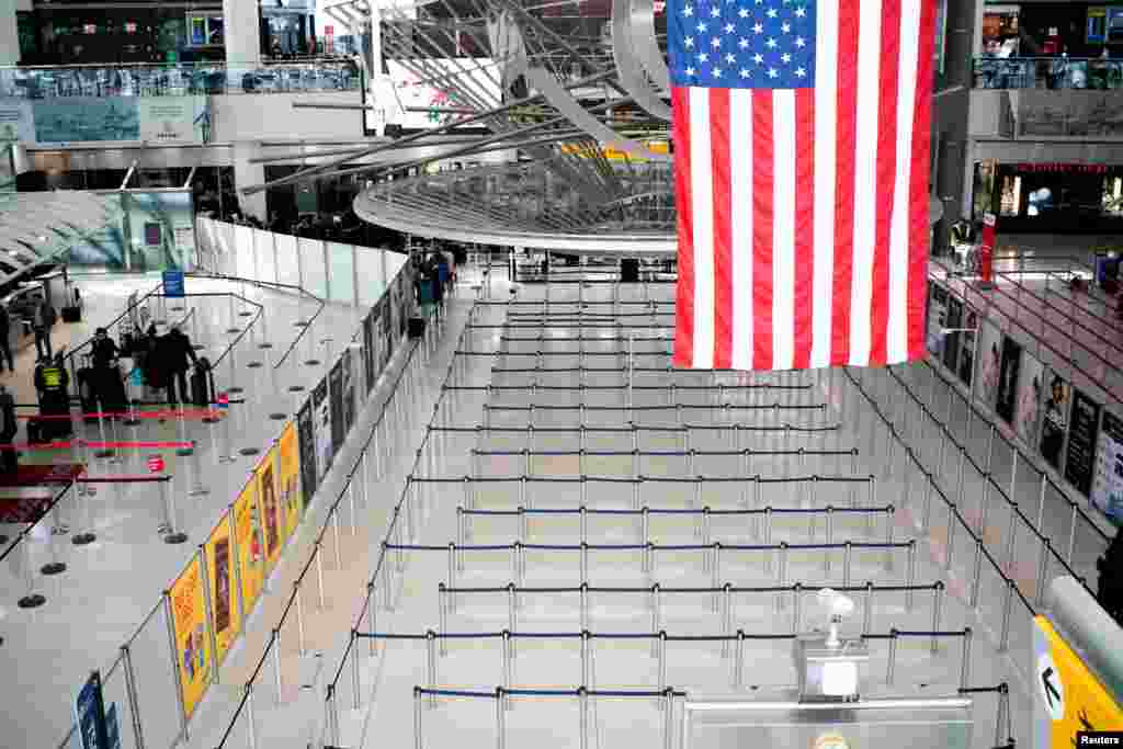 The lines to reach TSA immigration process are seen empty at one of its terminals at the John F. Kennedy International Airport in New York, March 9, 2020.