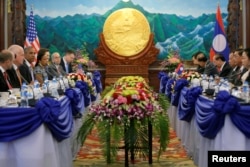 U.S. President Barack Obama (3rd L) sits down to a bilateral meeting with Laos President Bounnhang Vorachith (3rd R), ahead of the ASEAN Summit, at the Presidential Palace in Vientiane, Laos, September 6, 2016.