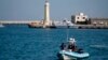 Menace de fermer les ports italiens aux migrants, selon la presse