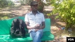 FILE: Itai Dzamara staging a sit-in at Harare's Africa Unity Square, October 21, 2014. (Photo: By Frank Chikowore)