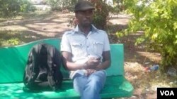 New Leader editor Itai Dzamara staging a sit-in in Harare's Africa Unity square Tuesday, October 21, 2014. (Photo: By Frank Chikowore)