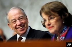 Senate Judiciary Committee Chairman Chuck Grassley, R-Iowa, left, looks to ranking member Sen. Dianne Feinstein, D-California, as Attorney General Jeff Sessions testifies before the Senate Judiciary Committee on Capitol Hill in Washington, Oct. 18, 2017.