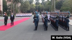 U.S. Secretary of Defense Jim Mattis, alongside Vietnamese defense minister Ngo Xuan Lich, reviews rows of soldiers in front of Hanoi's defense ministry, Jan. 25, 2018.
