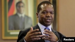 FILE: Zimbabwean central bank governor John Mangudya delivers his 2016 Monetary Policy statement in Harare, Feb. 4, 2016.