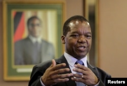 FILE - Zimbabwean Central Bank Governor John Mangudya delivers his 2016 Monetary Policy statement in Harare, Feb. 4, 2016.