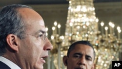U.S. President Barack Obama and Mexican President Felipe Calderon hold a news conference in the East Room of the White House, Mar 3, 2011