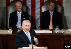 Perdana Menteri Israel Benjamin Netanyahu berpidato di rapat gabungan Kongres di depan Wakil Presiden AS Joe Biden (kiri) dan Ketua DPR John Boehner pada 2012. (Foto: Reuters)