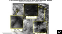 This graphic released by the Malaysian Remote Sensing Agency on Wednesday March 26, 2014, shows satellite imagery taken on March 23, 2014, with the approximate positions of objects seen floating in the southern Indian Ocean.
