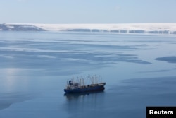 FILE - A krill fishing ship is pictured in Half Moon Bay, Antarctica.