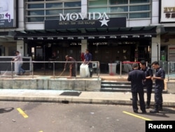FILE - The Movida bar is pictured after a grenade attack in Puchong, on the outskirts of Kuala Lumpur, Malaysia, June 28, 2016.